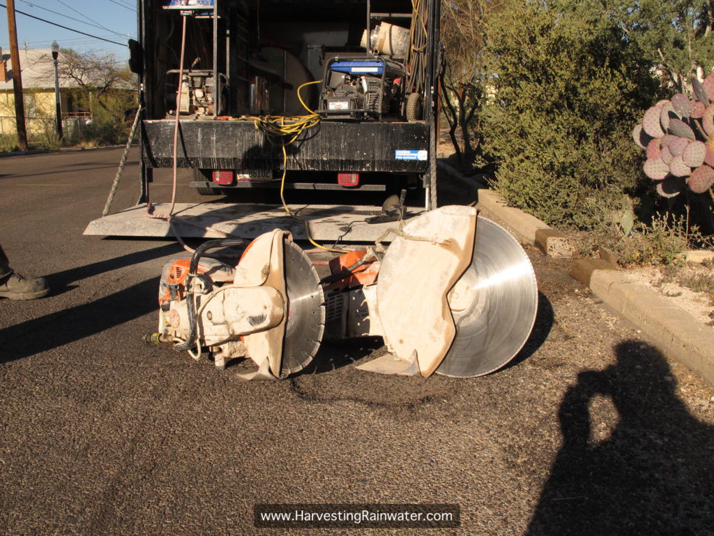 Gas-powered circular saws: 14-inch diameter blade on left, 20-inch diameter blade on right. Equipment owned by Tucson Concrete Cutting and Coring.
