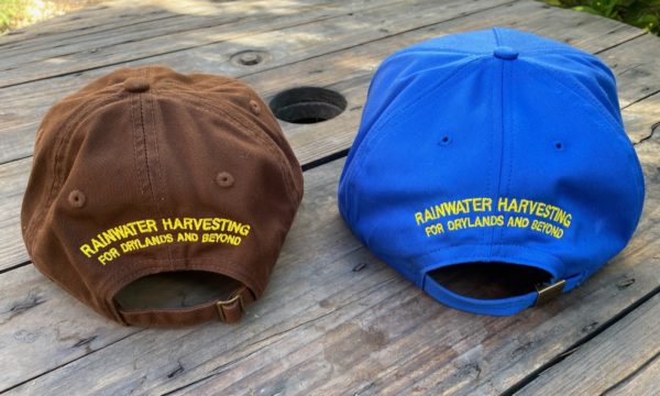 Back side of Plant the Rain baseball cap and trucker cap